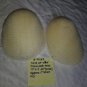 #7023 Pair of New Reglan Shoulder Pads
